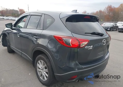2013 Mazda Cx-5 Touring z USA, uszkodzony, nr VIN JM3KE4CE1D0162533